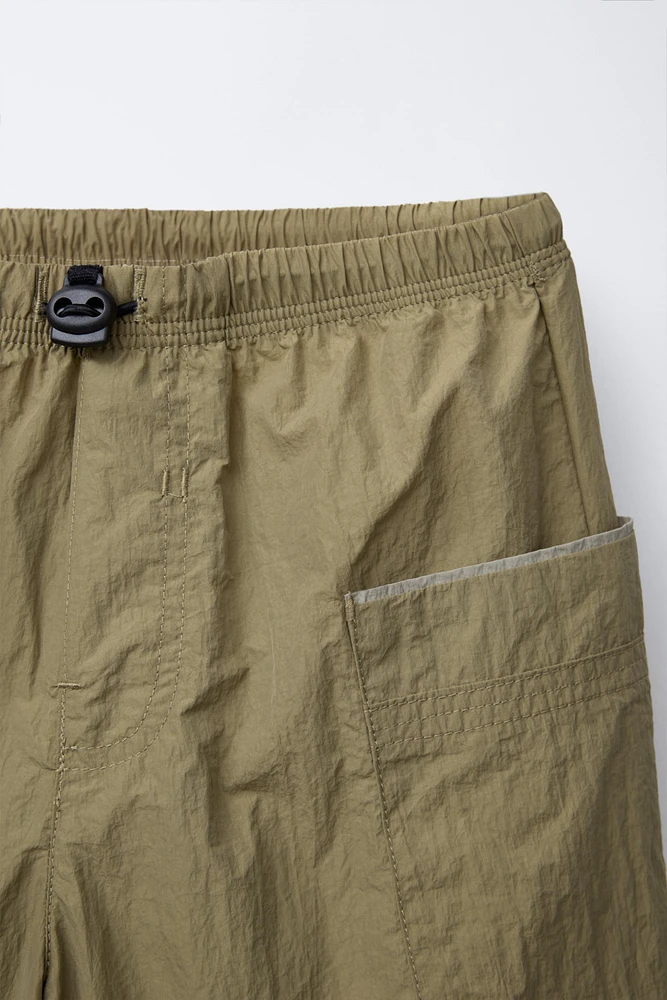 PANTALON NYLON AMOVIBLE BERMUDA