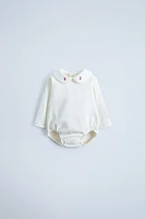 FLORAL EMBROIDERED PETER PAN COLLAR BODYSUIT