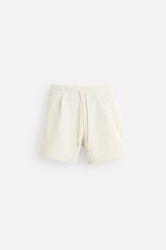 BERMUDA RELAXED FIT DÉLAVÉ