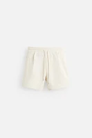 BERMUDA RELAXED FIT DÉLAVÉ