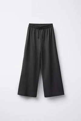 PANTALON FLUIDE À JAMBES LARGES