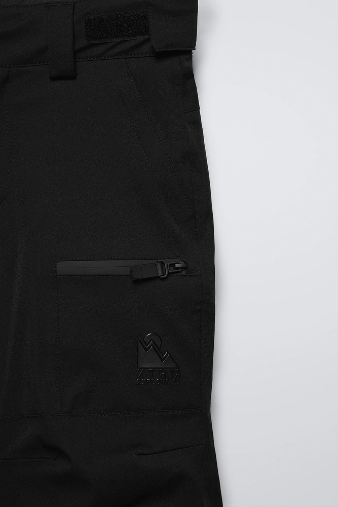 PANTALON COUPE-VENT ET DÉPERLANT RECCO® SYSTEM SKI COLLECTION