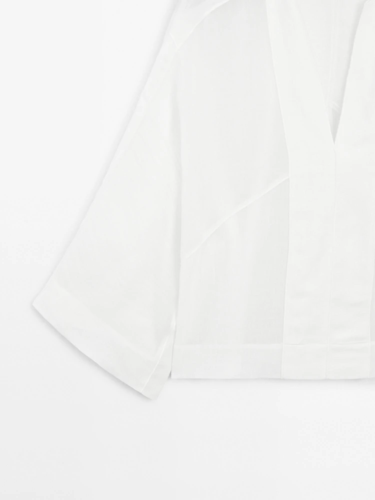 Flowing linen blend blouse with seam details