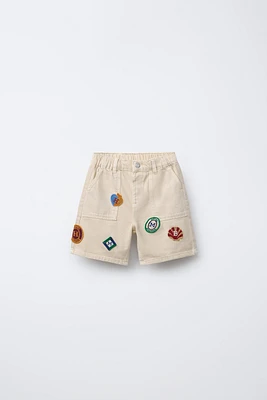 HÔTEL MAGIQUE © X ZARA PATCH SHORTS