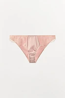 CULOTTE EN MATIÈRES VARIÉES BRODÉES