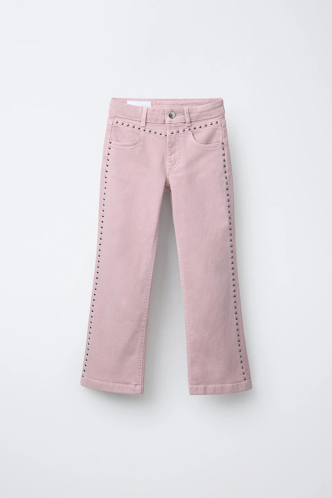 STUDDED FLARE JEANS
