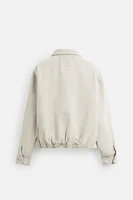 VESTE EN JEAN AVEC COL MATIÈRES VARIÉES