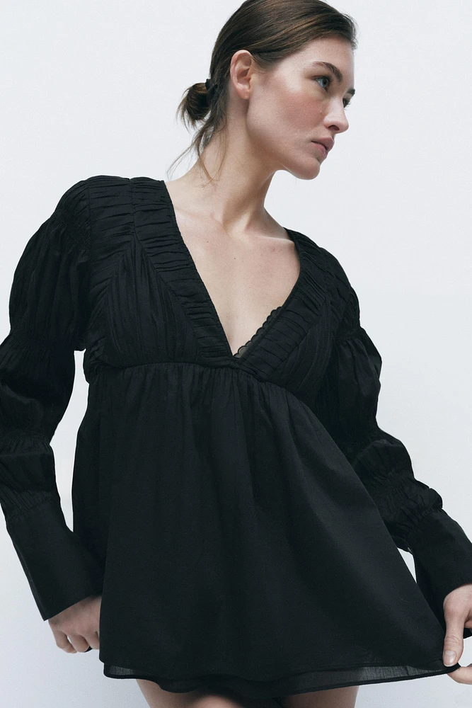 PLEATED ELASTIC BLOUSE