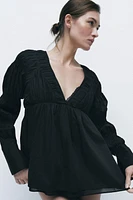 PLEATED ELASTIC BLOUSE