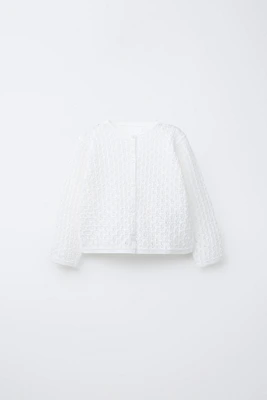 GILET EN MAILLE AJOURÉE