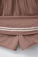 TEXTURED BOW SKORT
