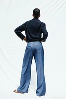PANTALON LARGE À PASSANTS