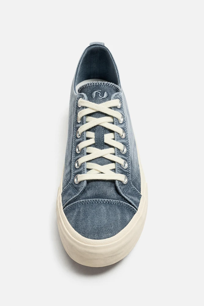 DISTRESSED FABRIC SNEAKERS