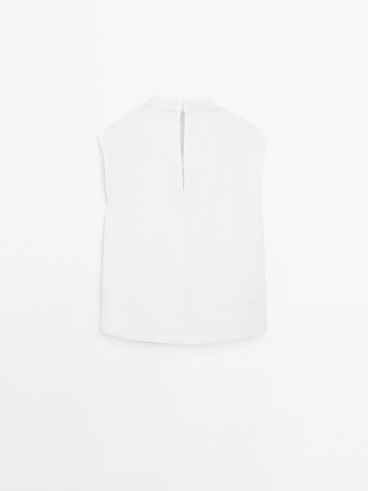 Flowing blouse with draped collar