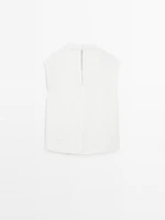 Flowing blouse with draped collar