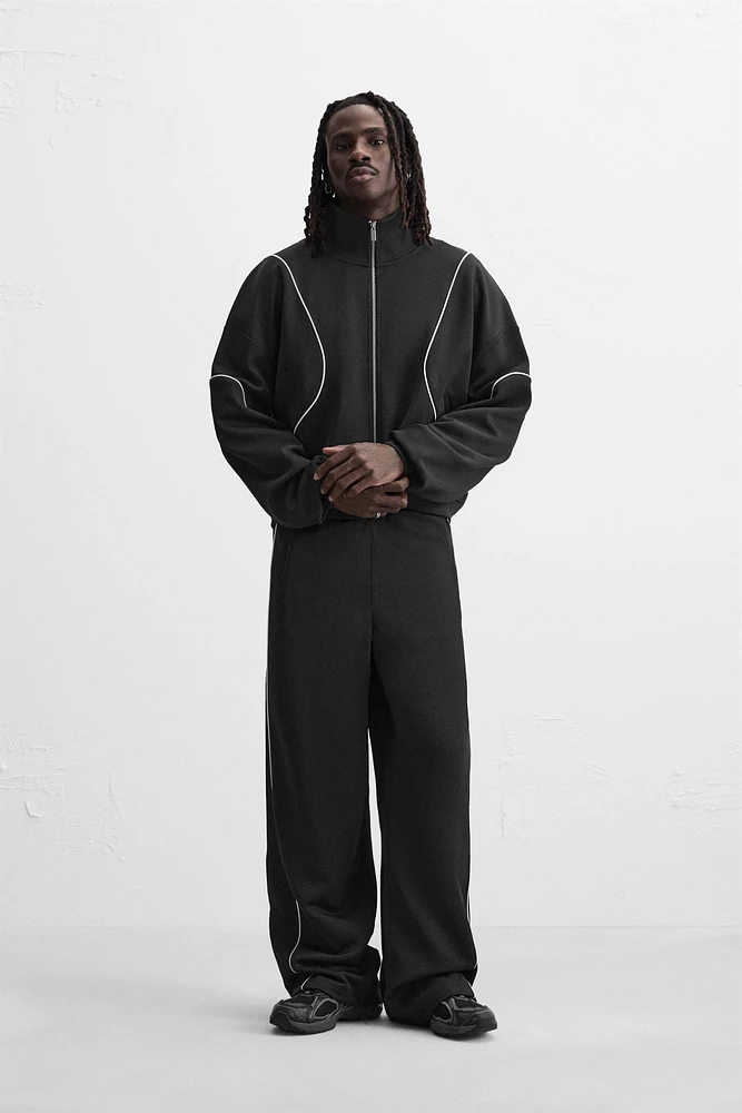 VESTE TECHNIQUE CONTRASTÉE
