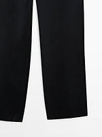 Pantalon fluide satiné et texturé