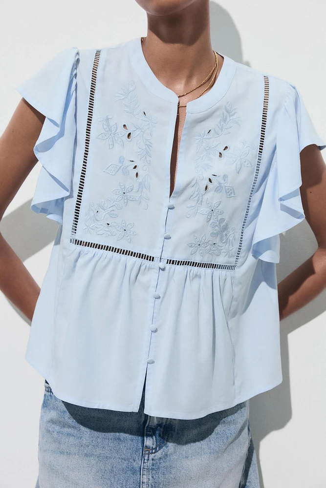 SHORT SLEEVE RUFFLE SHIRT