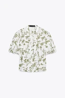 PRINTED TOP WITH EMBROIDERED EYELETS