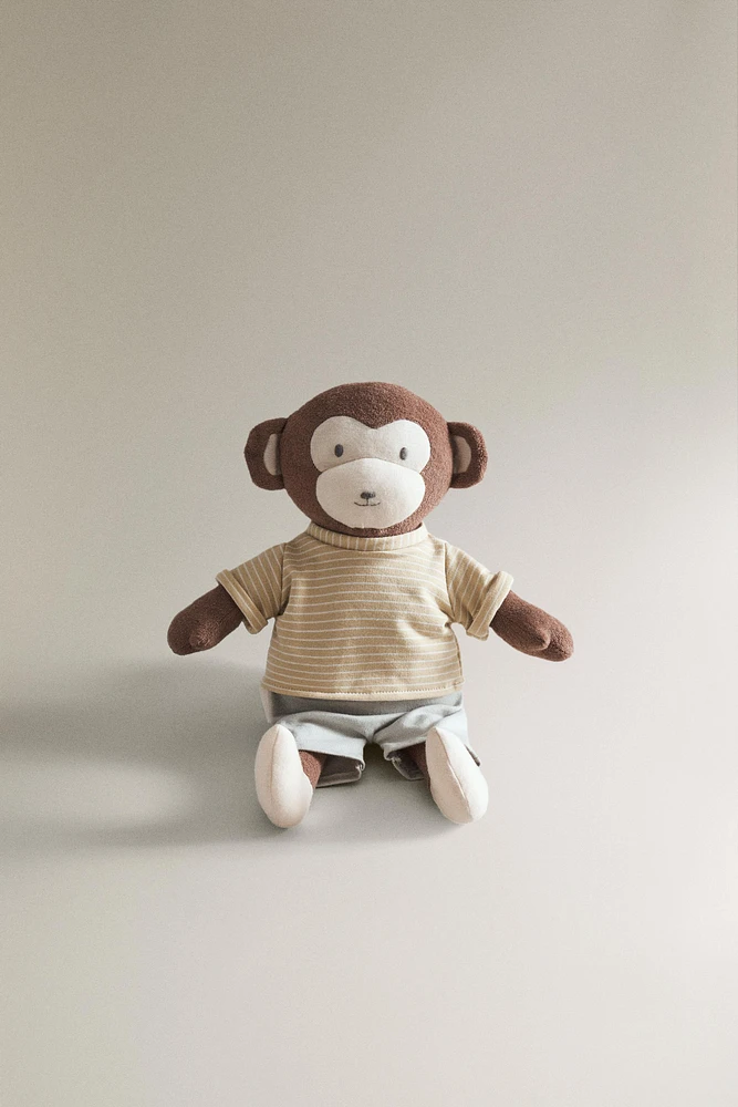 PELUCHE ENFANT SINGE MUSICAL