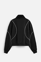 VESTE TECHNIQUE CONTRASTÉE