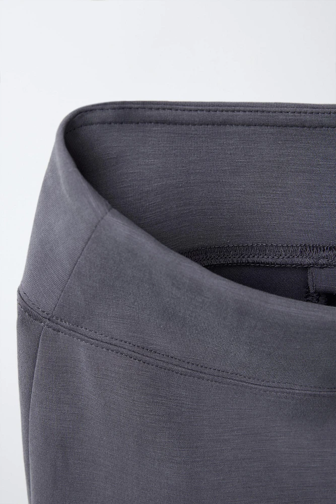 BUTTONED FLARED LEGGINGS