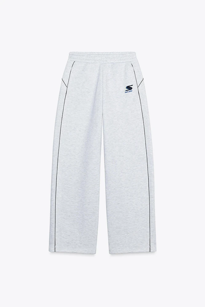 PIPED TRIM TEXT PANTS