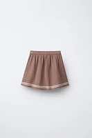 TEXTURED BOW SKORT