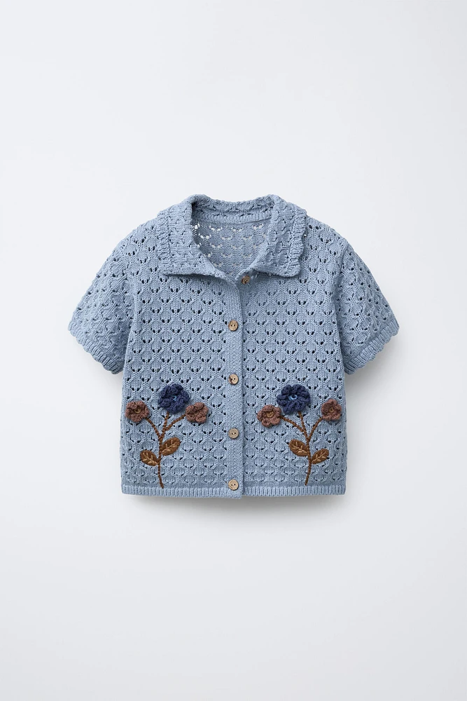 POLO EN MAILLE À FLEURS CROCHET