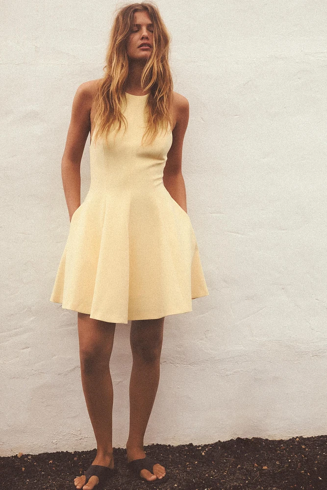 SHORT HALTER GODET DRESS