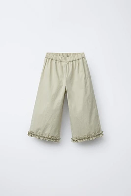 PANTALON EN POPELINE À VOLANTS