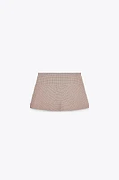 JUPE-SHORT À PLIS PLATS