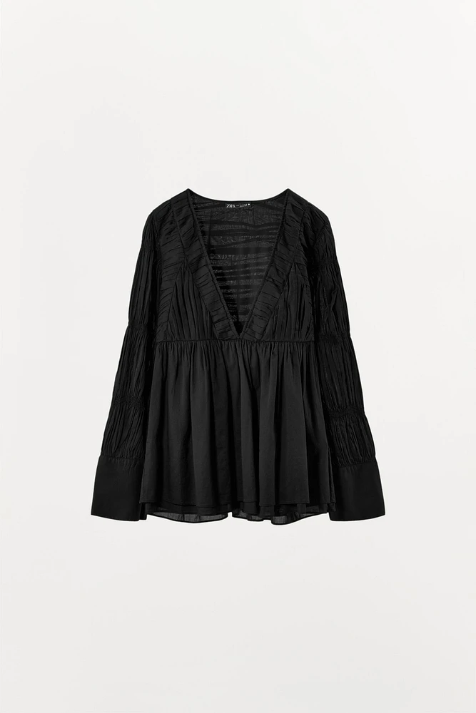 PLEATED ELASTIC BLOUSE