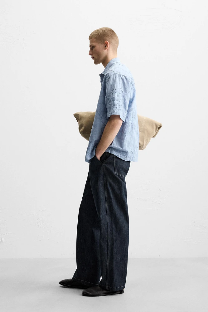 STRAIGHT FIT BELTED JEANS