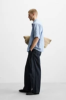 STRAIGHT FIT BELTED JEANS