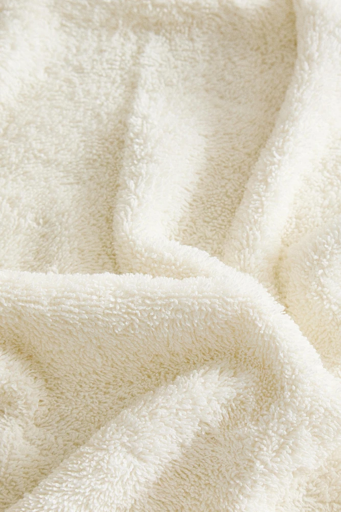 SERVIETTE DE BAIN POMPONS