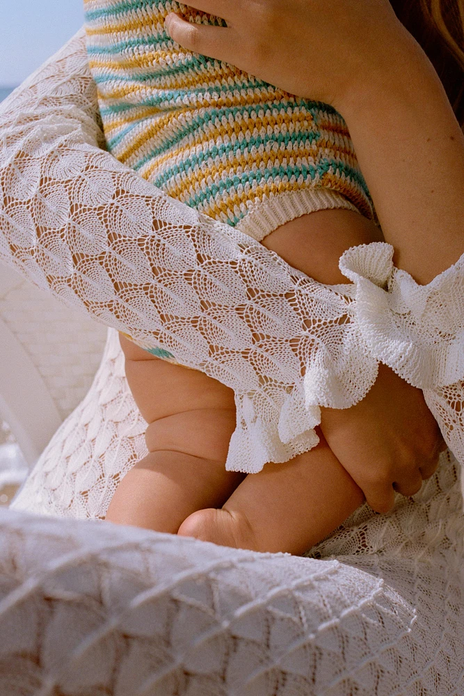 STRIPED KNIT ROMPER