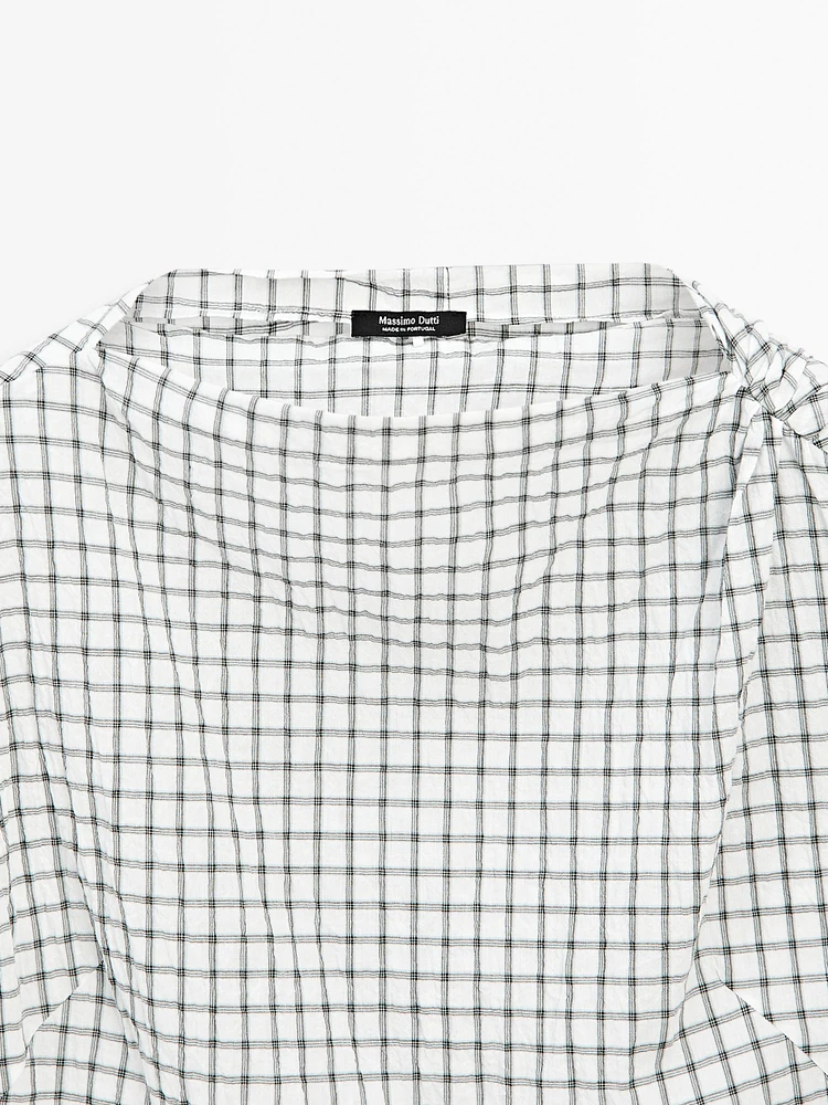 Draped neck check top
