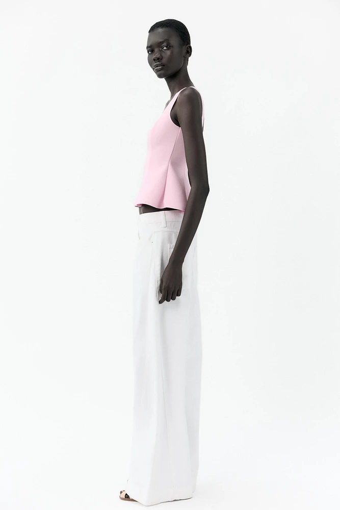STRETCH PEPLUM VEST TOP
