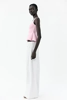 STRETCH PEPLUM VEST TOP