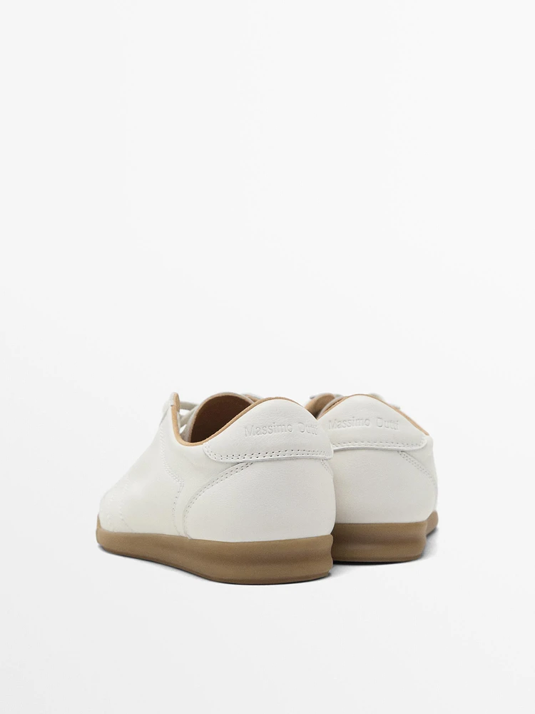 White topstitched trainers