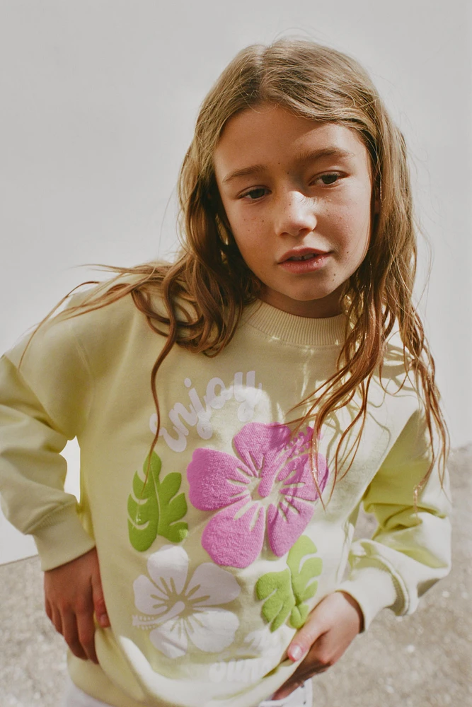 RAISED FLORAL SWEATSHIRT