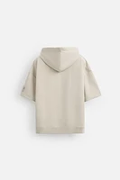 SWEAT TECHNIQUE À CAPUCHE