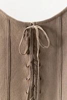 CORSET EN MAILLE À LACETS
