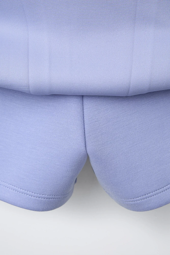 PLEATED TECH SKORT