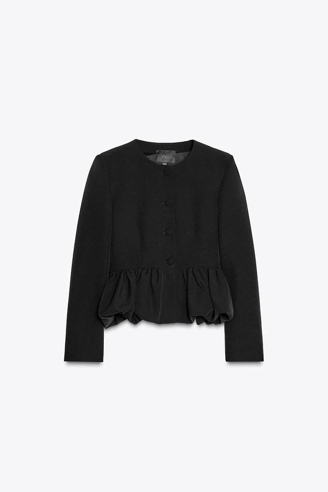 VESTE AVEC BAS VOLUMINEUX