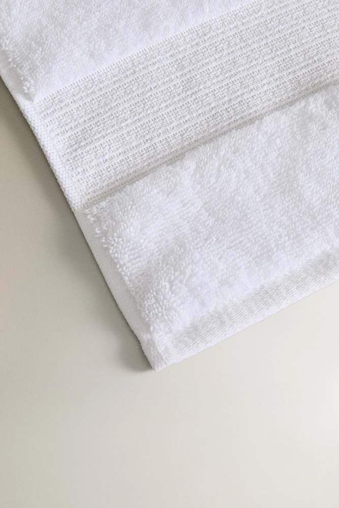 SERVIETTE DE BAIN BORDURE FIL MÉTALLISÉ