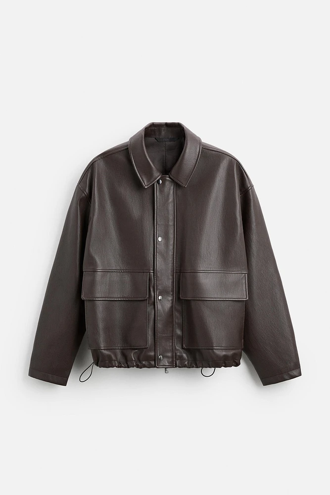 BLOUSON EN MATIÈRE SYNTHÉTIQUE