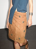 Suede leather skirt with rhinestone detail