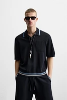 POLO EN MAILLE À POCHE